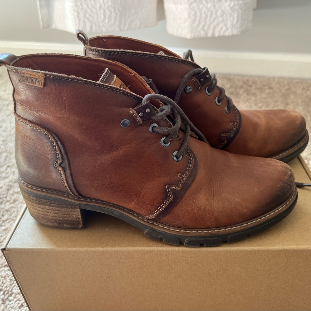 PIKOLINOS lace-up combat boots.